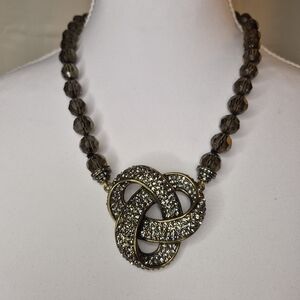 Heidi Daus Topaz Crystal In Gold Classic Love Knot Necklace